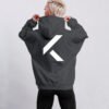 Rear view of India Ink Grey oversized hoodie featuring large white KK logo back print. Clean minimalist design with dropped shoulders and premium heavyweight construction