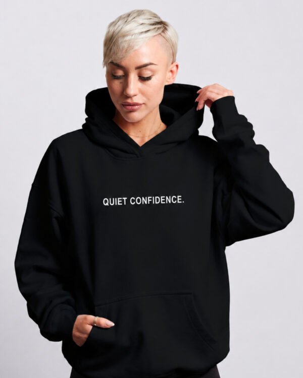 kk-hoodie-Quiet-Confidence-Black-face-on-C-chest-hero Oversized hoodie-Quiet-Confidence streetwear uk