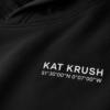 Detailed close-up of Kat Krush coordinates print on heavyweight hoodie fabric showing clean typography, sharp DTG print quality and premium material texture.