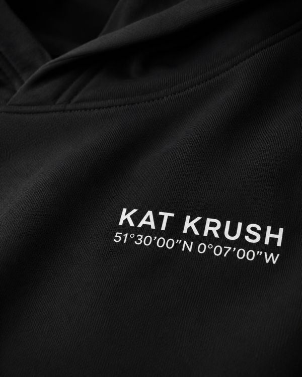 Detailed close-up of Kat Krush coordinates print on heavyweight hoodie fabric showing clean typography, sharp DTG print quality and premium material texture.