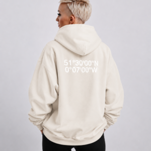 Coordinates collection 3 Waist-up fit shot of Natural Raw oversized hoodie with London coordinates back print. Clean oversized silhouette with dropped shoulders and minimal streetwear styling.