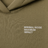 Detailed close-up of khaki hoodie chest print featuring minimalist white “MINIMAL NOISE MAXIMUM IMPACT” typography on heavyweight textured fabric with clean modern streetwear styling.