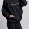 quiet-confidence-hoodie-black-fit-oversized Black oversized hoodie relaxed fit front pocket and drape minimal streetwear
