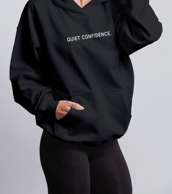 quiet-confidence-hoodie-black-fit-oversized Black oversized hoodie relaxed fit front pocket and drape minimal streetwear