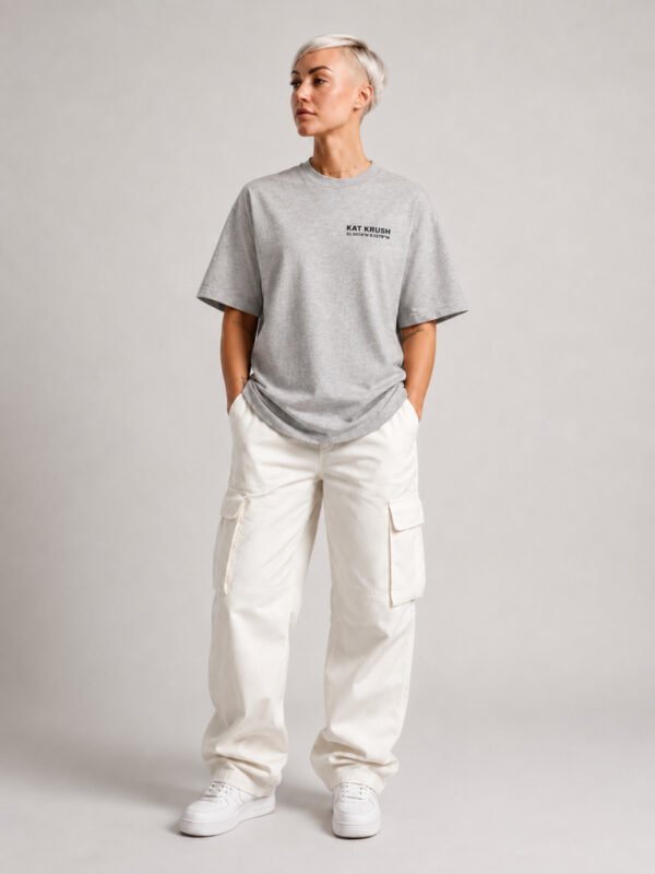 "Heather Grey oversized Kat Krush London coordinates t-shirt with black chest logo. Relaxed heavyweight streetwear fit styled with off-white cargo trousers."
